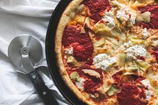 Pizza chứa tinh bột tinh chế và chất béo bão hòa làm cản trở quá trình giảm cân